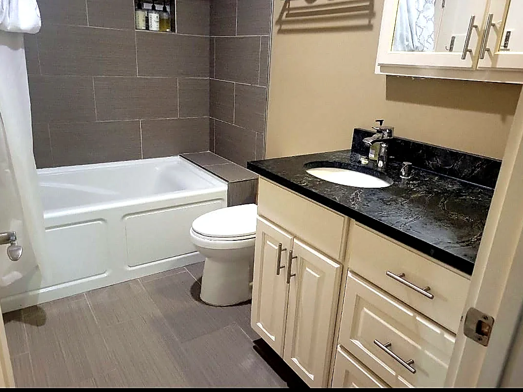 Clean gray tile bathroom